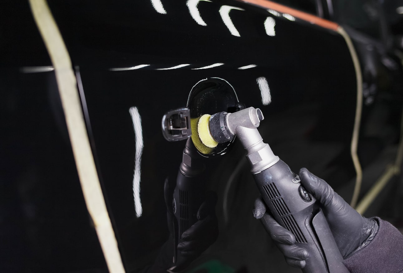 Car body workshop in Muscat